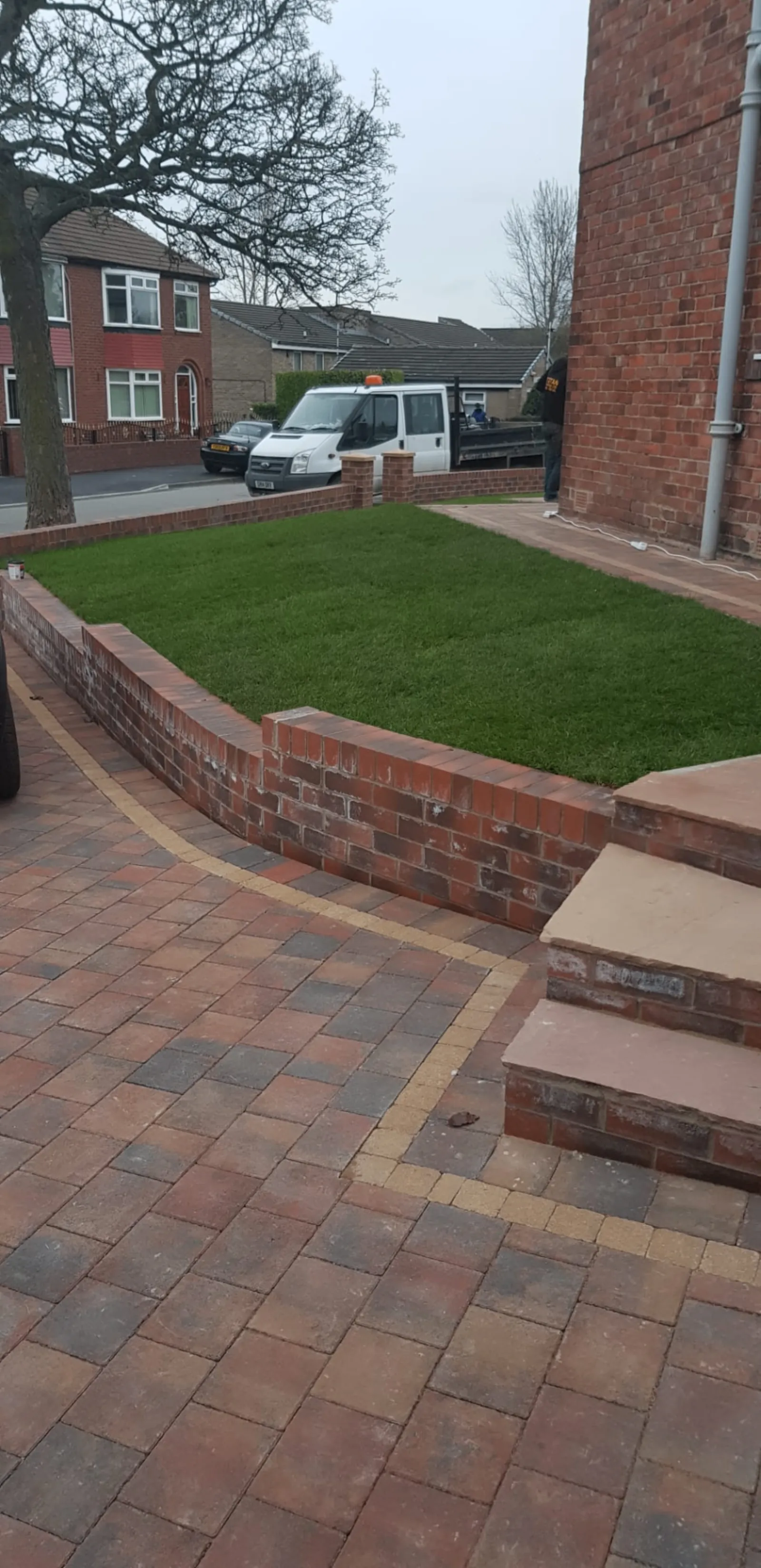 Block paved driveway with matching steps