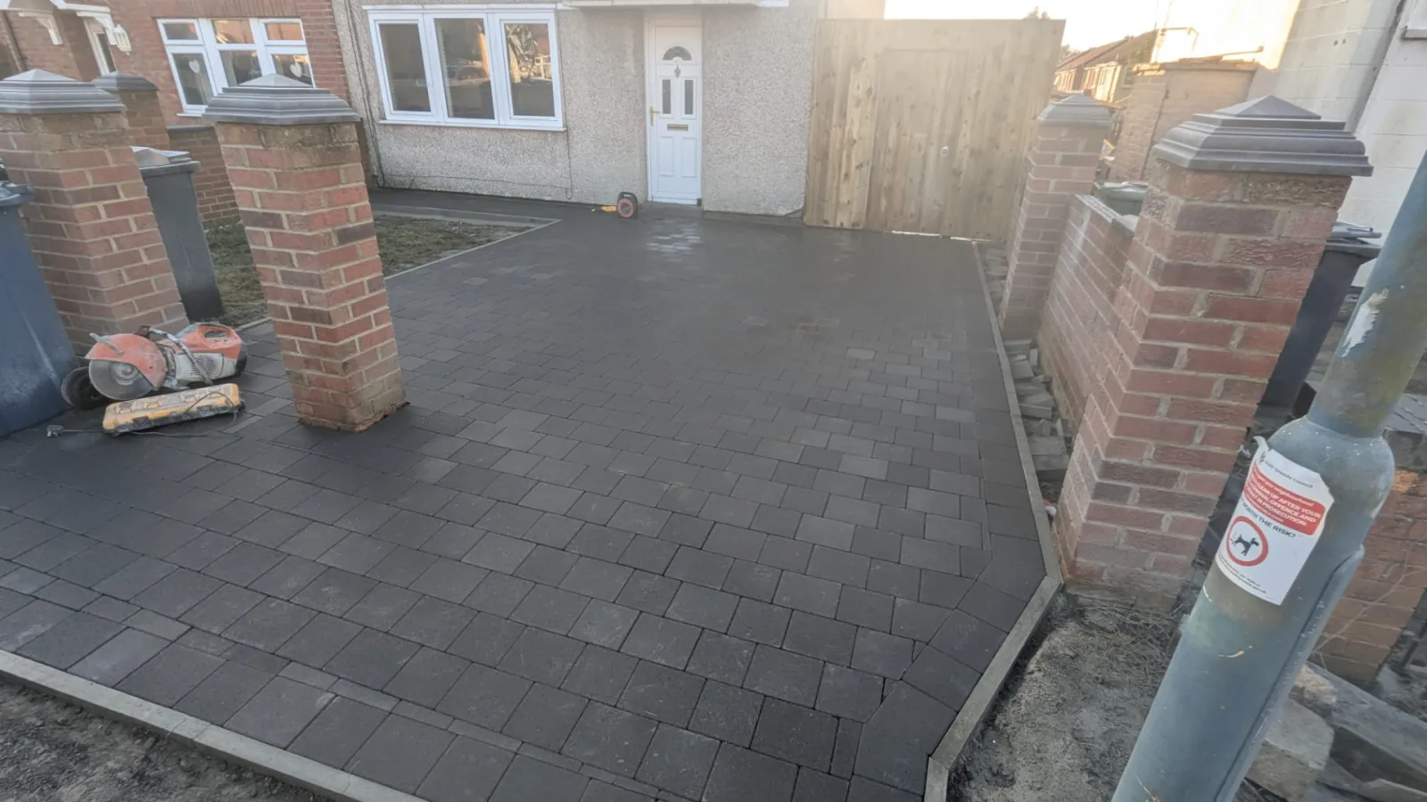Freshly laid charcoal block paved driveway