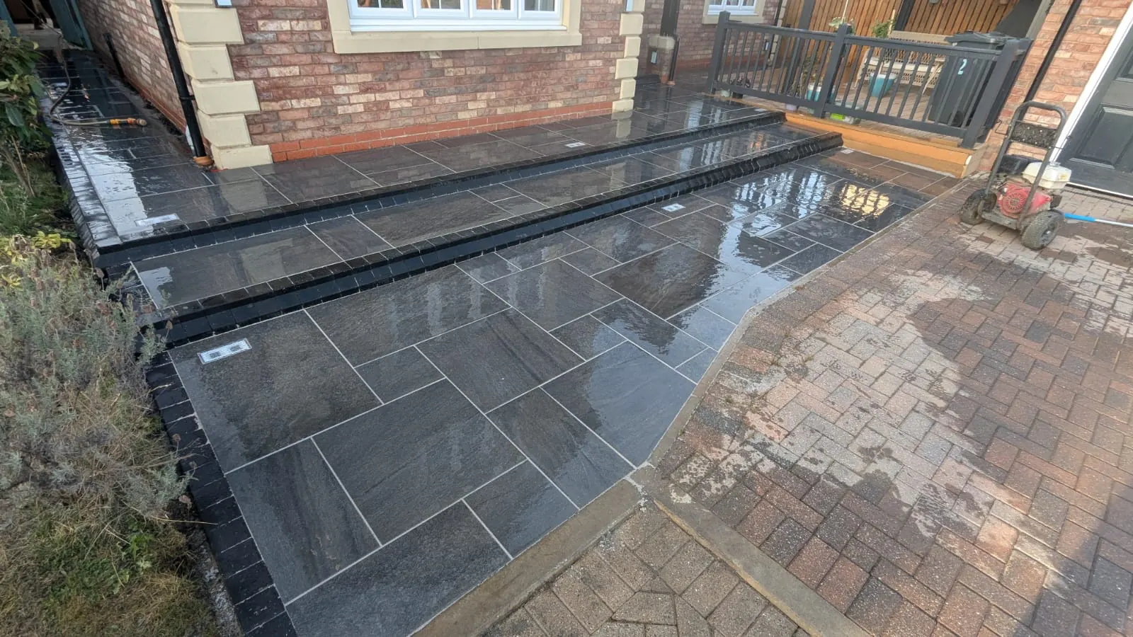 Dark slate paving and steps installation