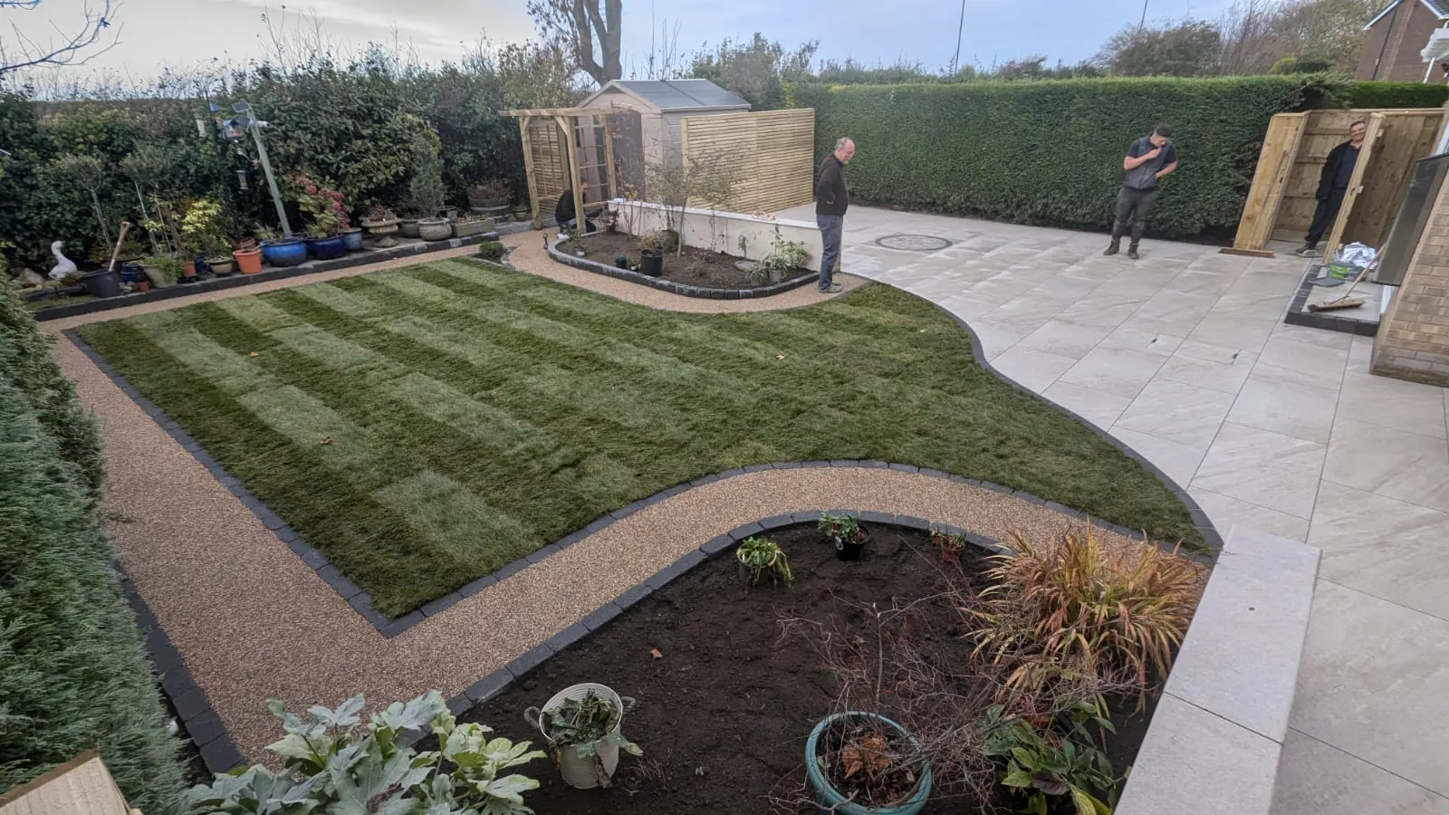 Landscaped garden with curved stone paths