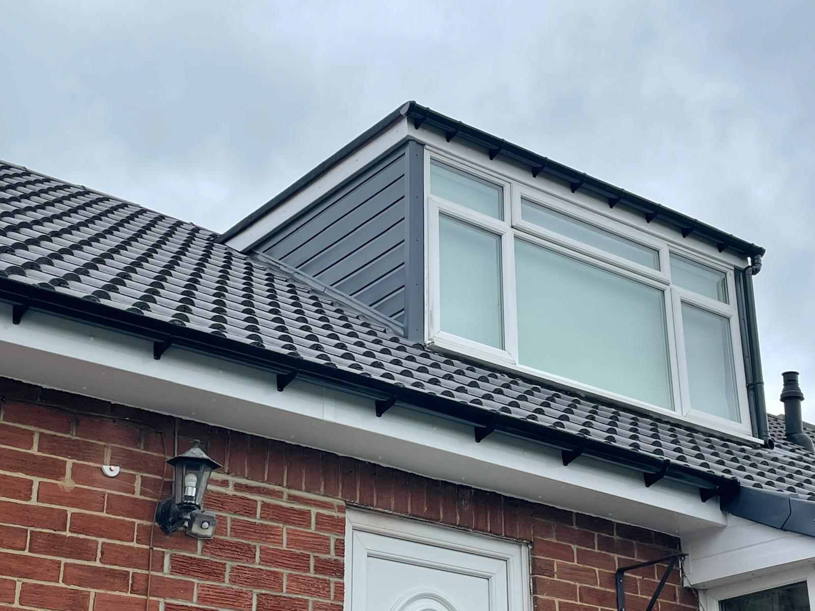 Dormer roofline with new fascias and guttering