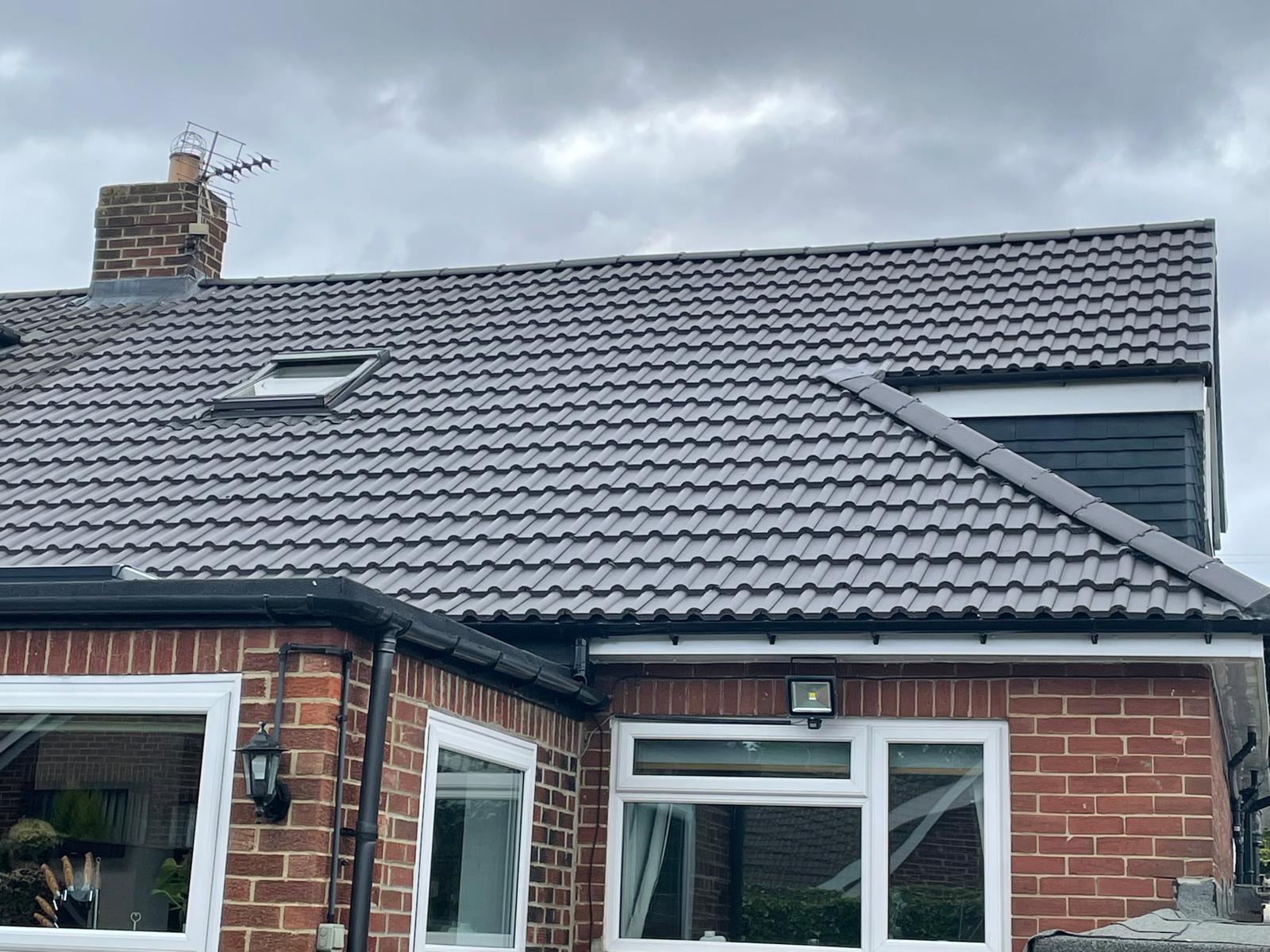 Completed rear roof elevation in grey tiles